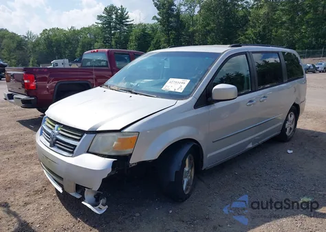 2010 Dodge Grand Caravan Sxt z USA, uszkodzony, nr VIN 2D4RN5D12AR154955